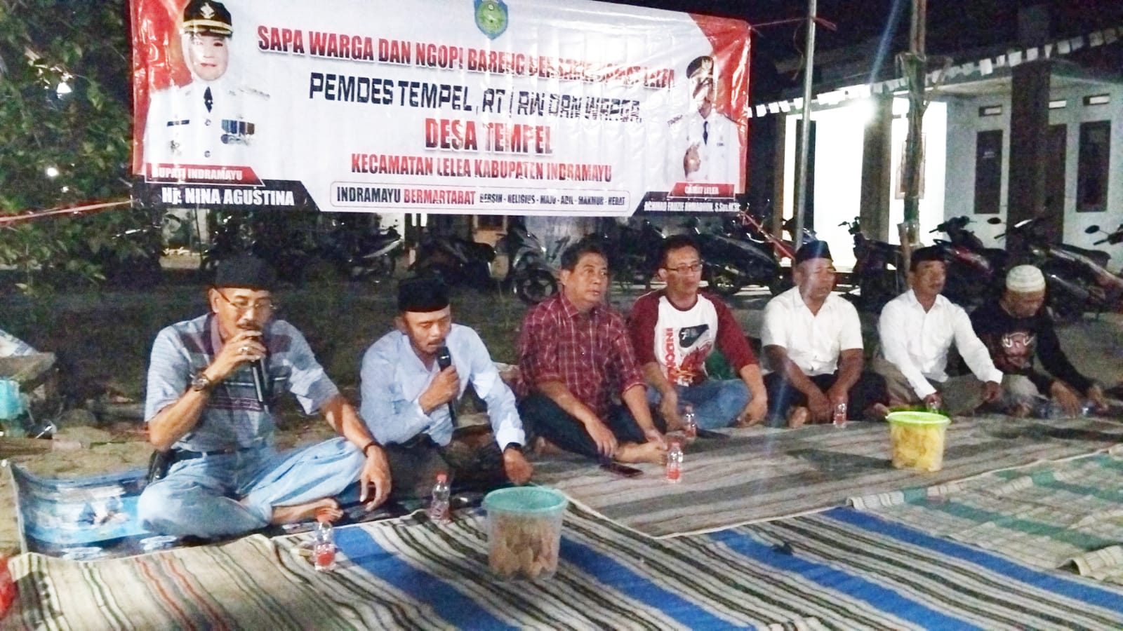 Camat Lelea Menyampaikan 10 Program Unggulan Bupati Nina Kepada Warga Desa Tempel